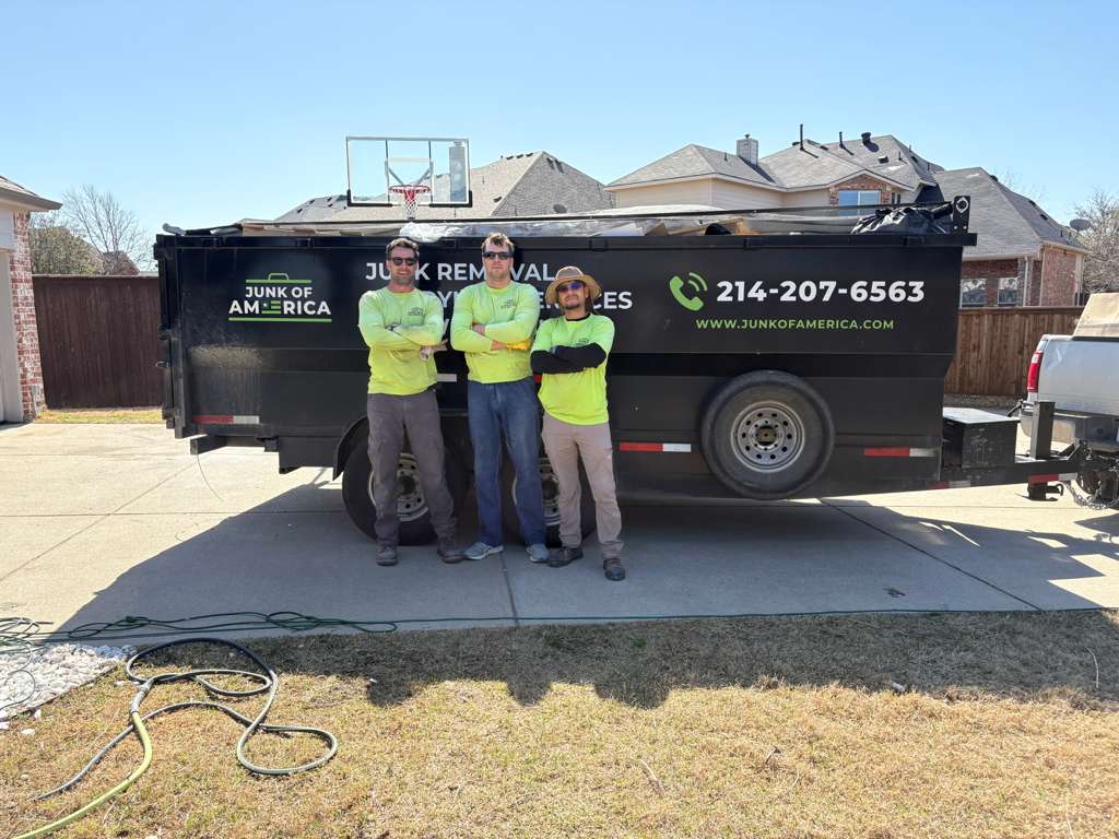 Junk of America crew with branded trailer in Plano, Texas